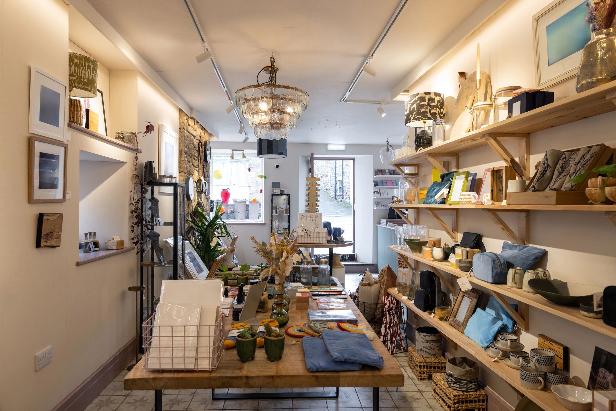 Cozy shop interior with warm lighting and neatly arranged shelves